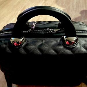 Hard shell cosmetic case.